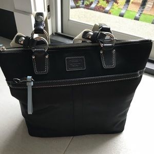 Black coach bag with baby blue detailing